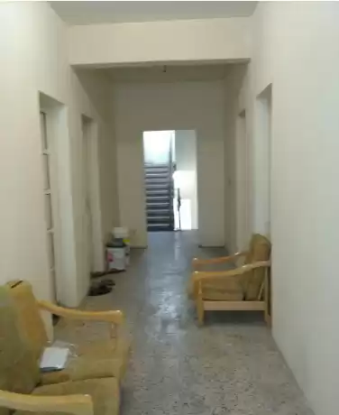 سكني عقار جاهز 7+ غرف  غير مفروش سكن عمال  للإيجار في الدوحة #7376 - 1  صورة 